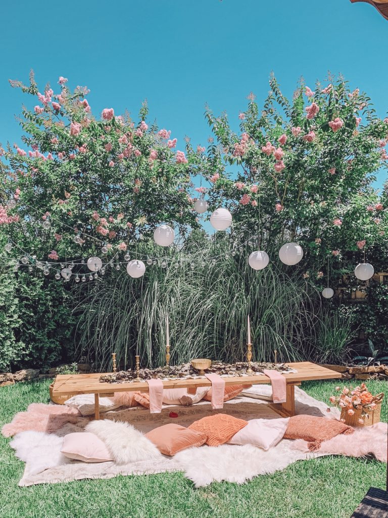 outdoor summer tablescape with paper lanterns