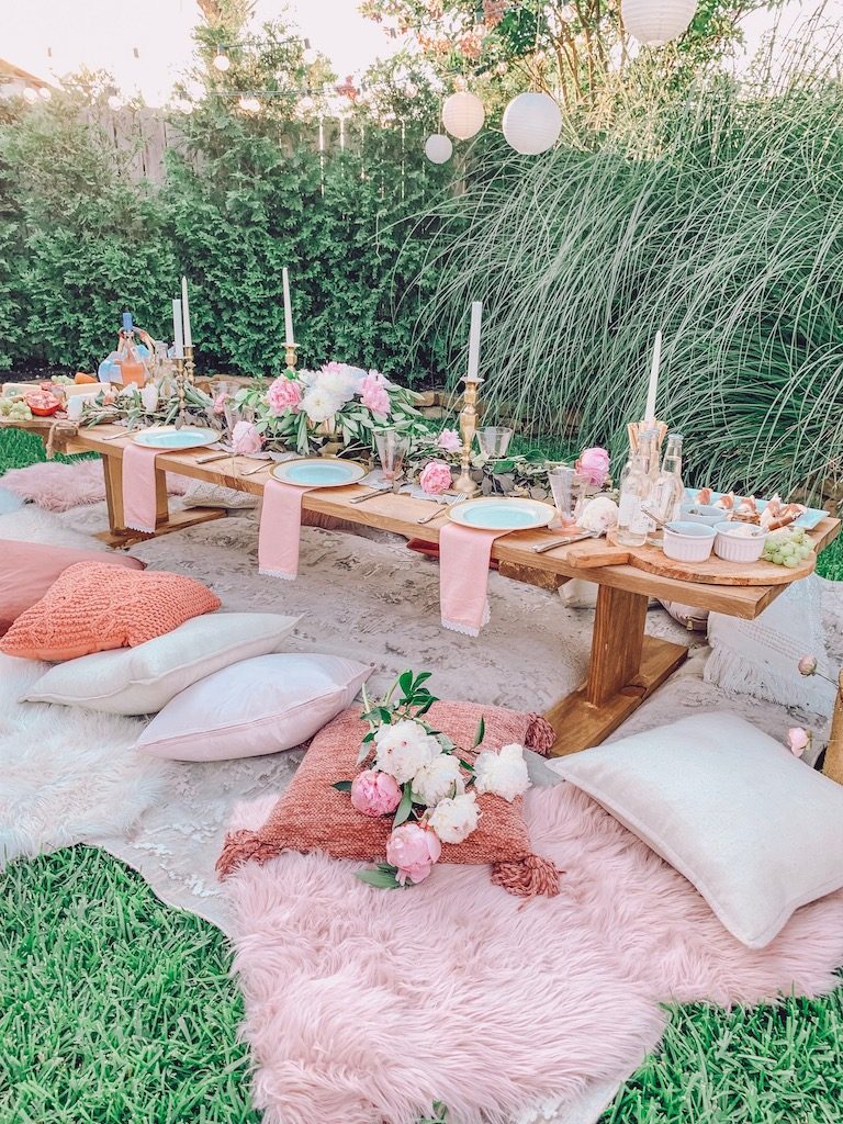 outdoor summer tablescape with pink touches