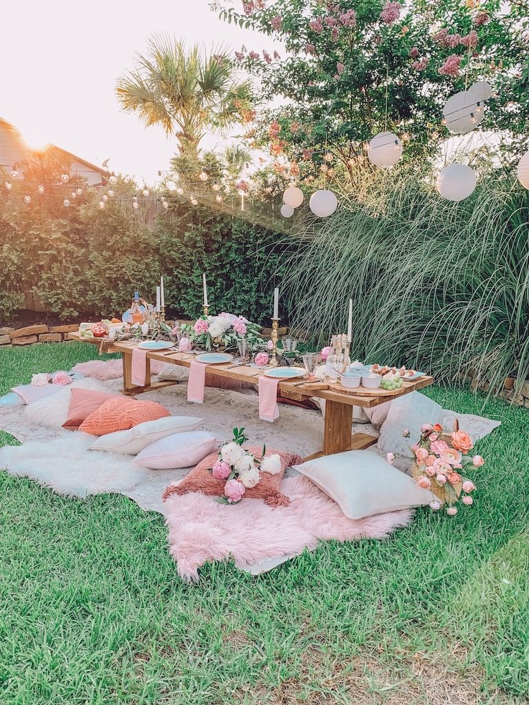 outdoor summer tablescape with paper lanterns 