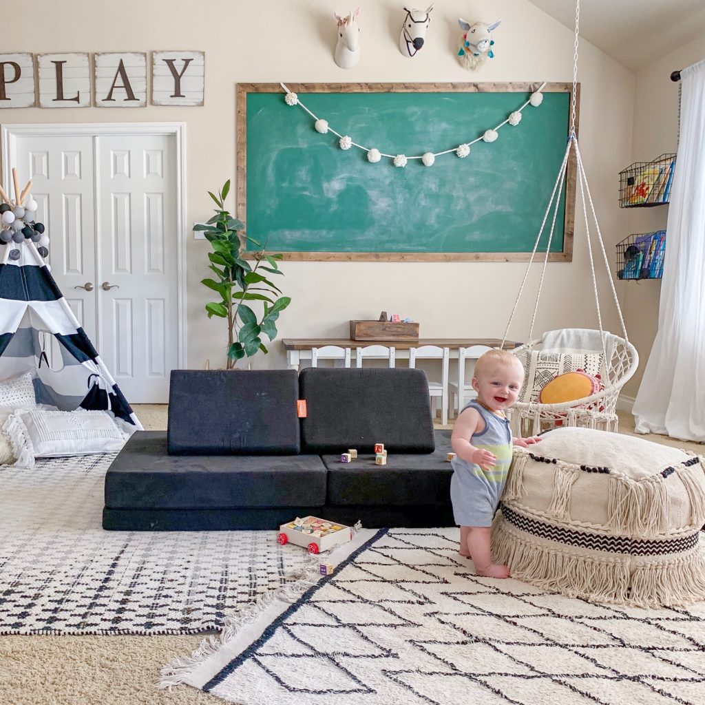 kids modern farmhouse playroom with black nugget