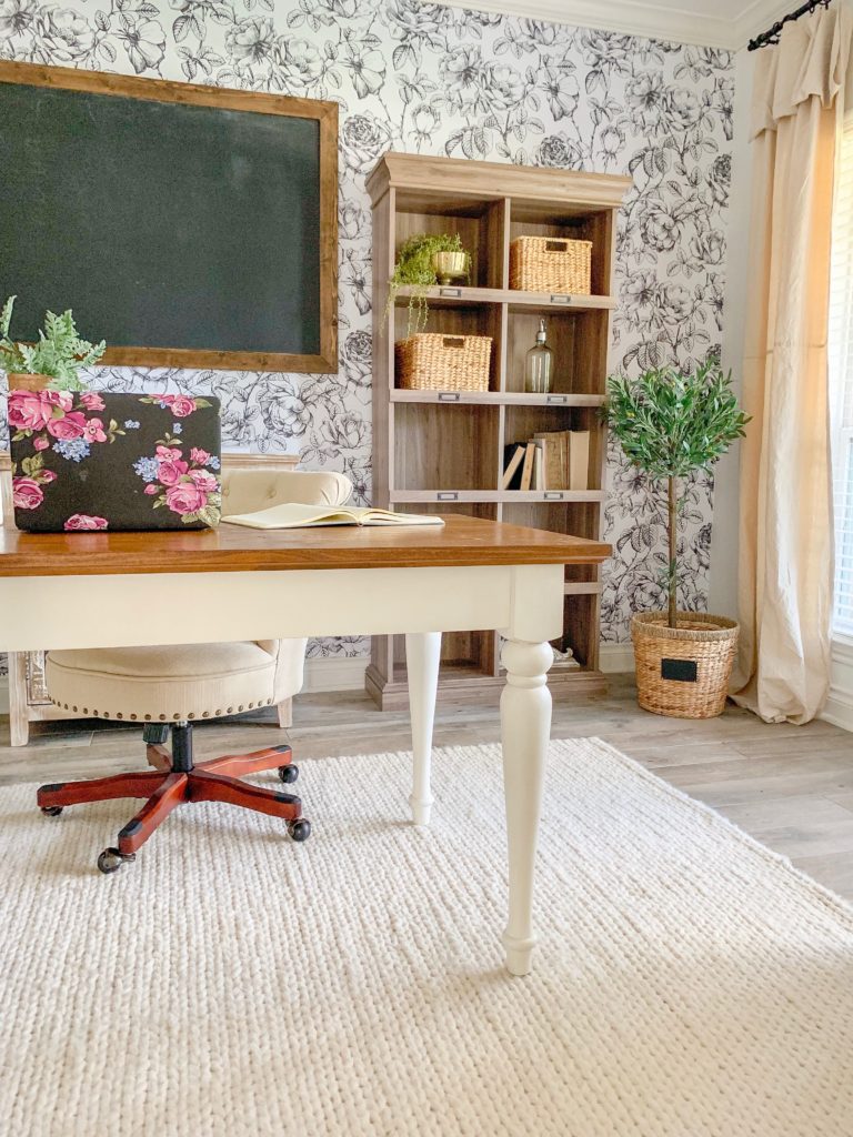 a modern farmhouse office with black and white removable wallpaper