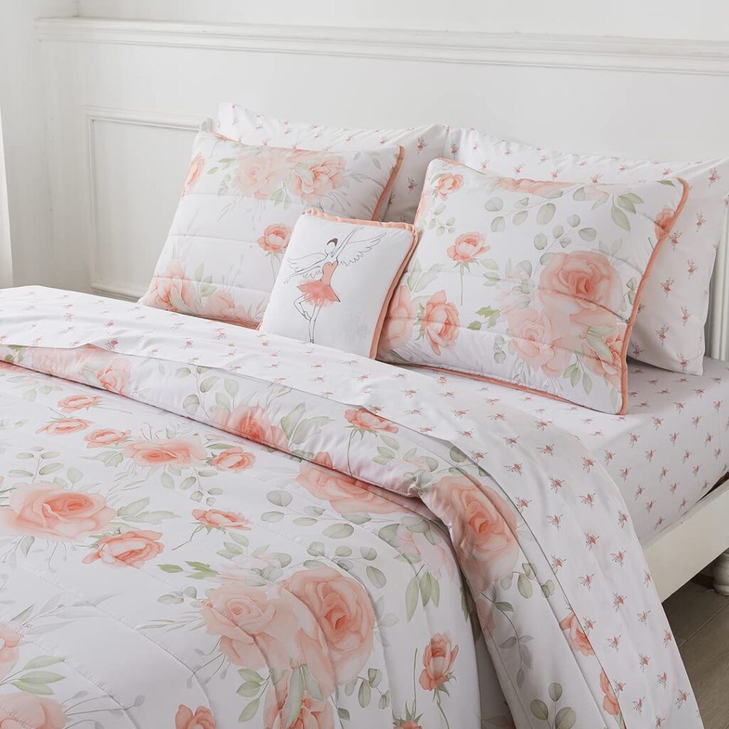 Pink floral quilt with coordinating ballerina sheets