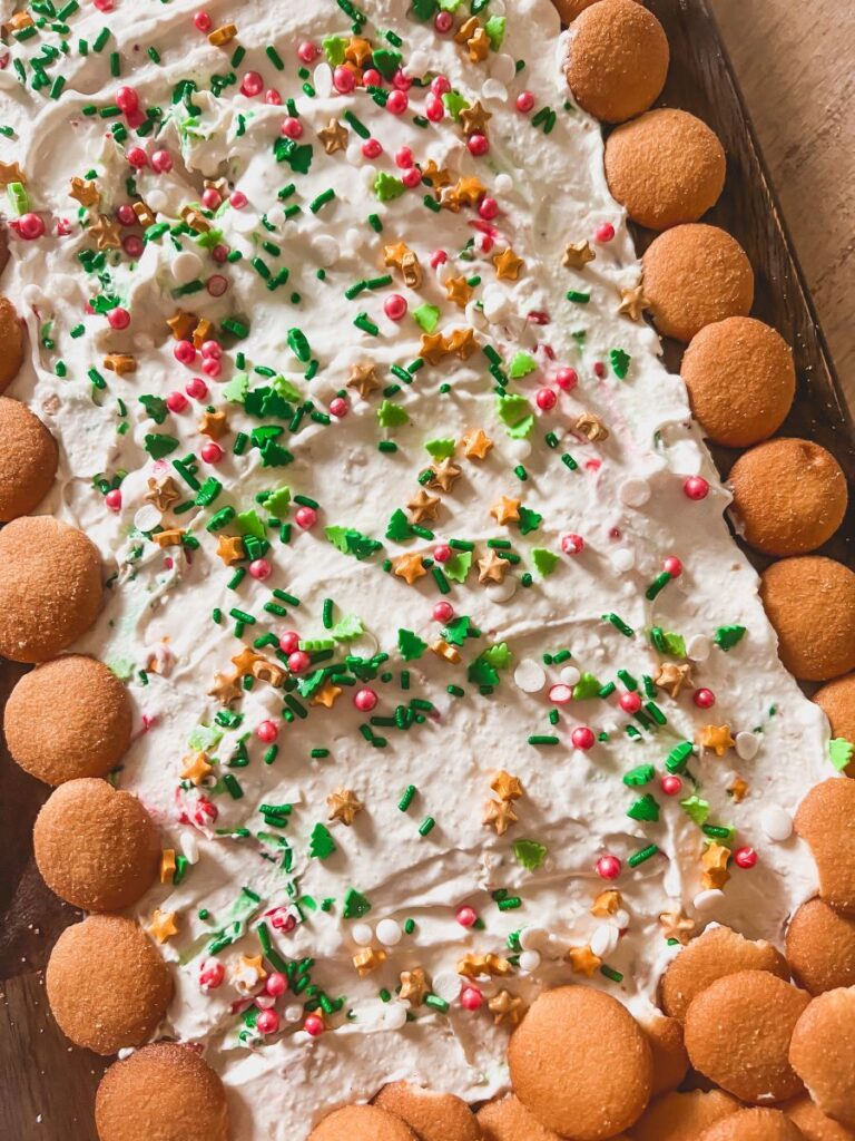 Close-Up of Christmas Tree Cake Dip surrounded by Vanilla wafers