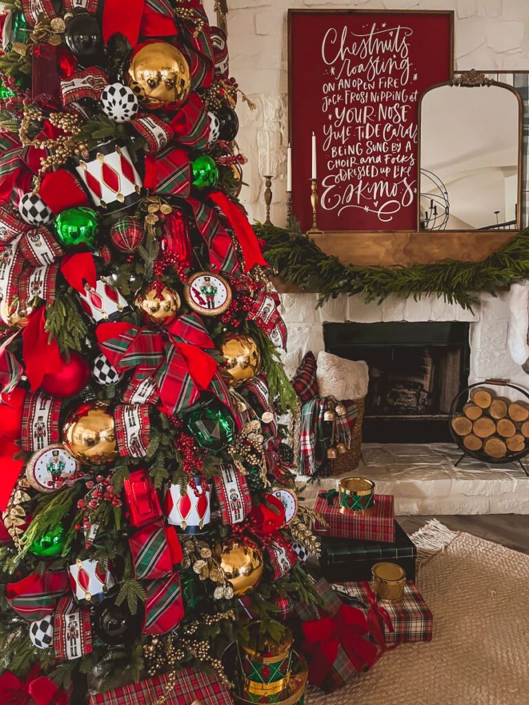 A decorated Christmas Tree and mantle creates a cozy holiday scene 