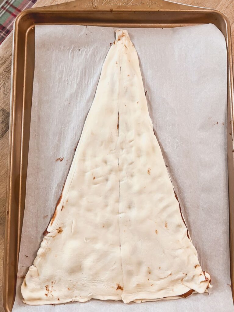 Pastry dough in triangle Christmas tree shape