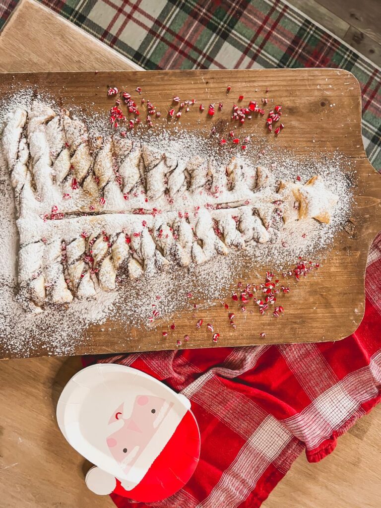 Pastry tree on cutting board with Santa plate