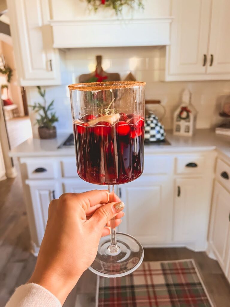 Wine glass with holiday sangria recipe