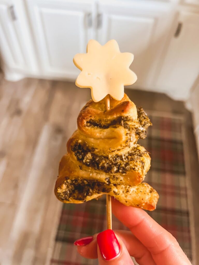 Pesto Puff Pastry on a skewer with a cheese snowflake topper