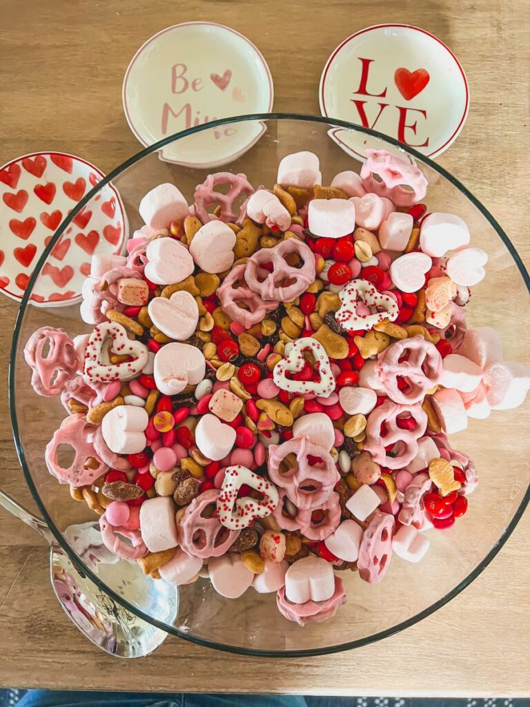 Clear bowl full of Cupid Crunch Valentine's Day Trail Mix
