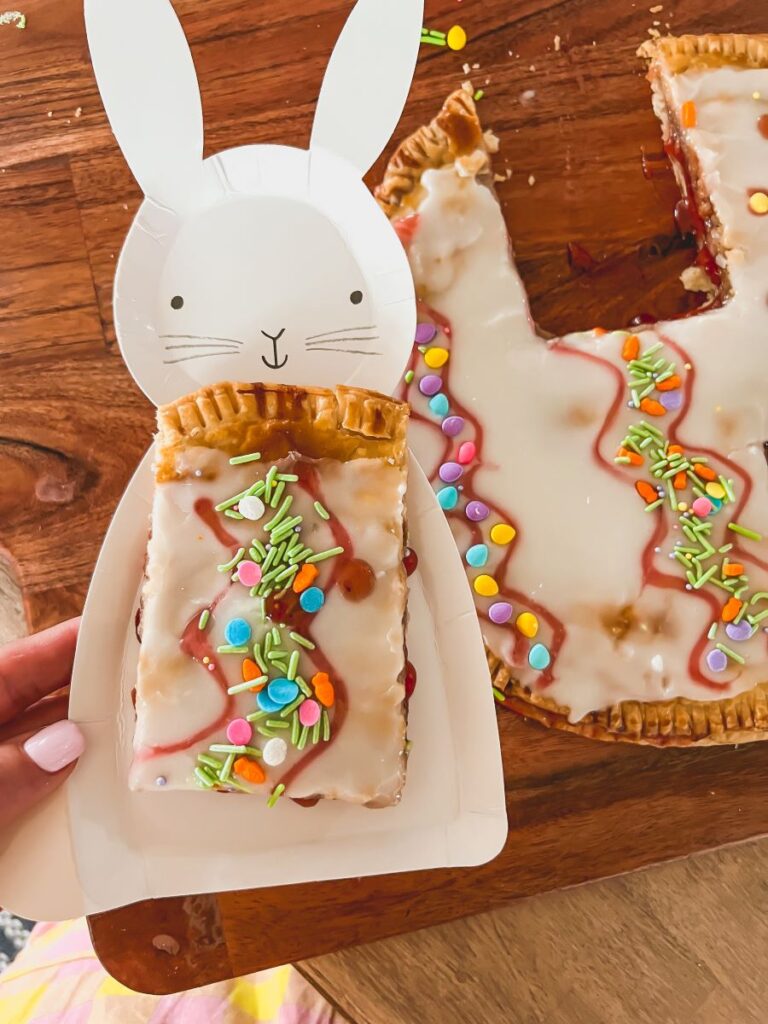 Close-up of homemade Easter Egg Pop Tart with sprinkles on a cute bunny plate
