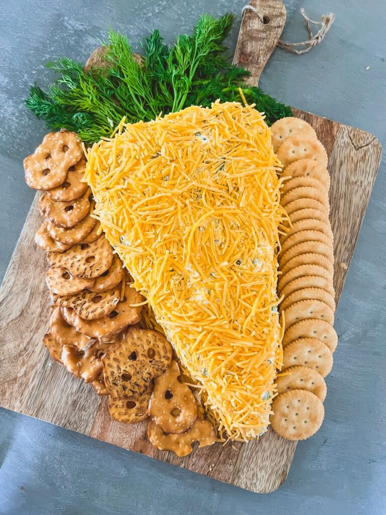 Carrot-Shaped Cheese Ball surrounded by crackers