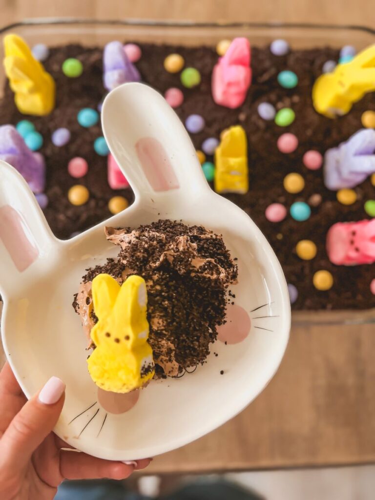 Leanna holding Easter dirt cake with cute bunny plate