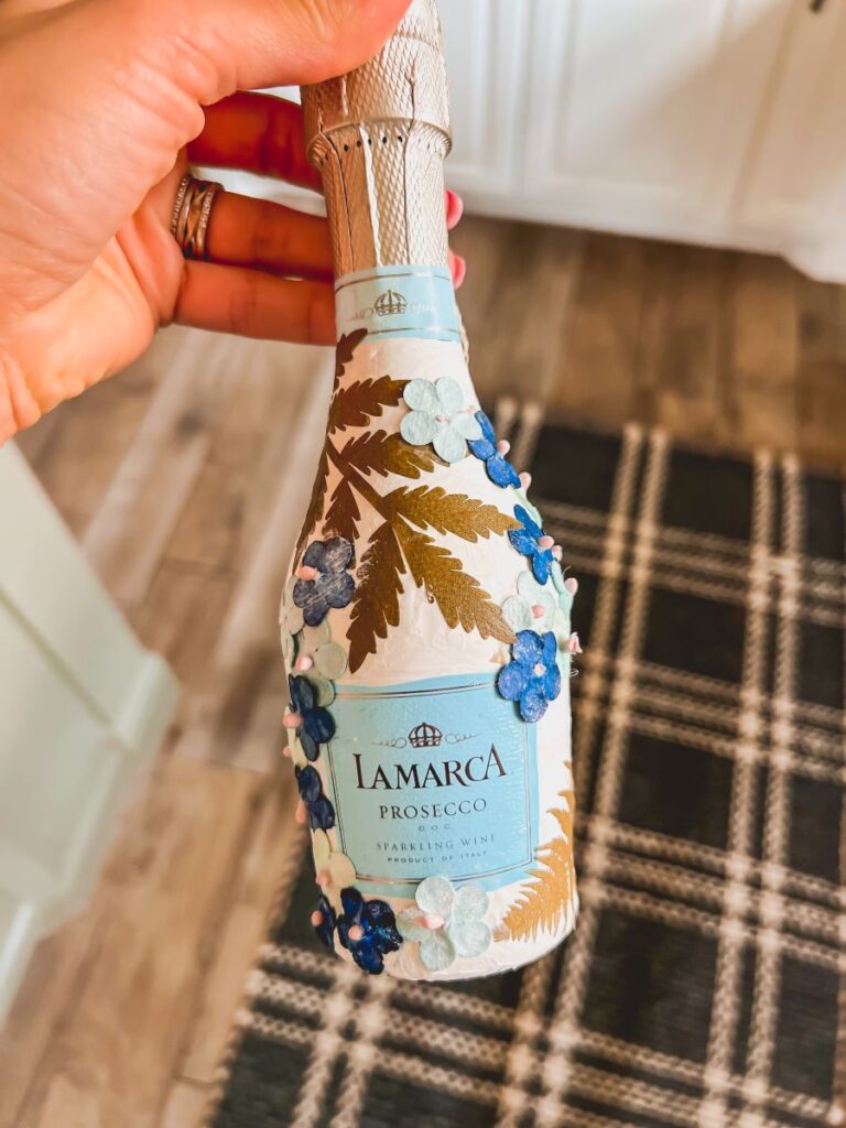 Champagne Bottle with Blue Flowers