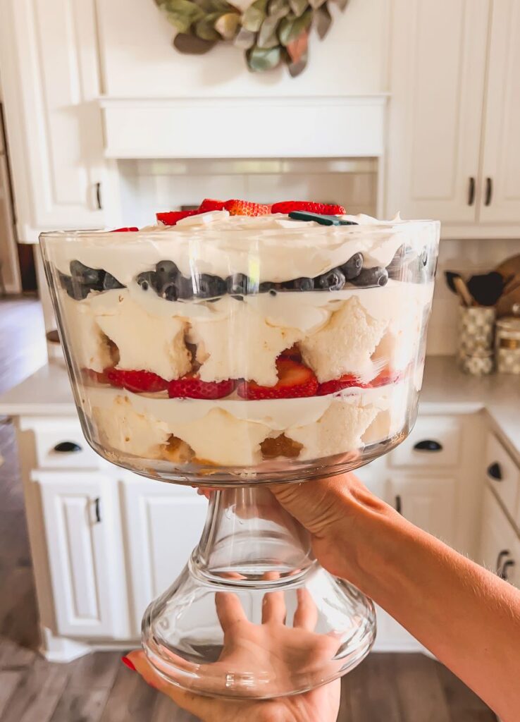 Leanna holding a berry trifle dish