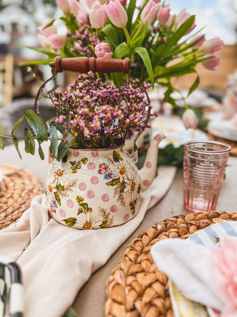 Teapot with purple Flowers in it