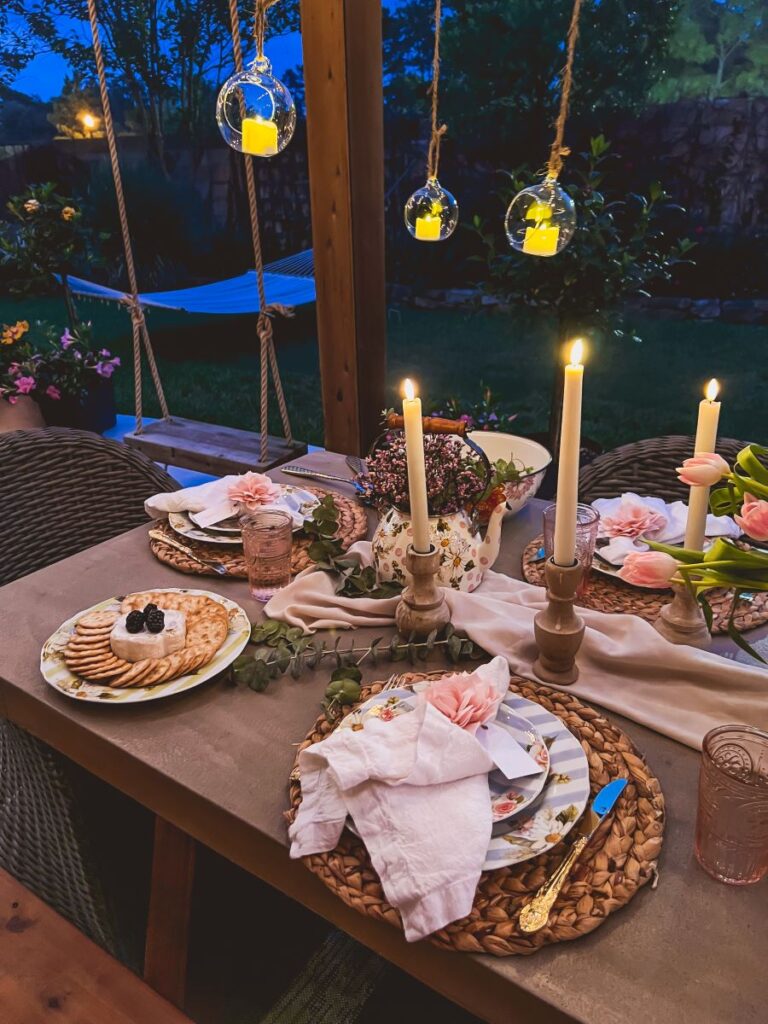 Candles light up a pretty Garden party table