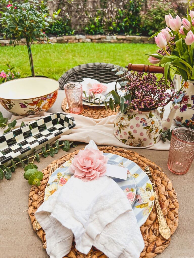 Floral plate with nape tag at a garden party