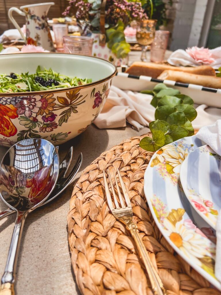 Woven plate charger topped with floral plates