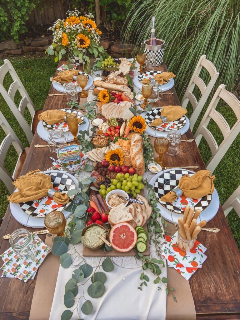 Pretty outdoor table sprinkled with sunflowers