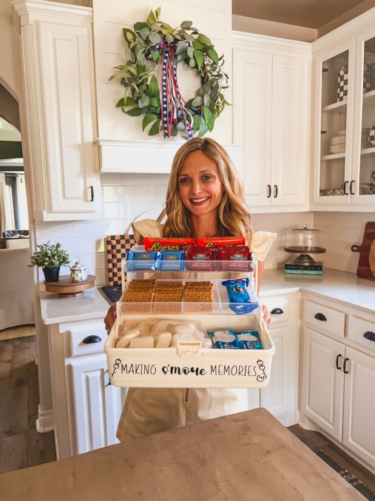 Leanna holding a S'mores Tackle Box