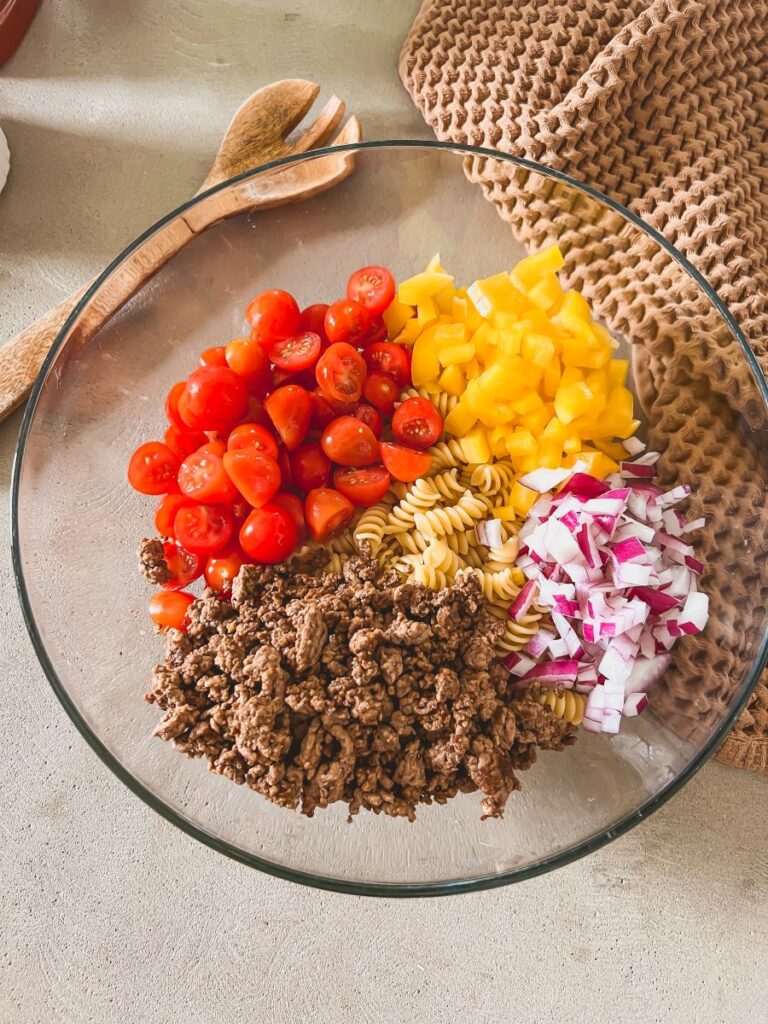 Taco Pasta Salad Ingredients in a clear bowl