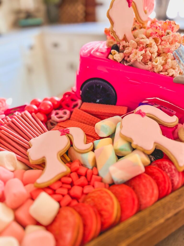 Barbie cookie on a themed food board