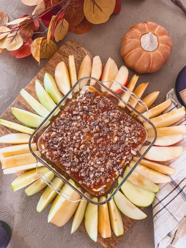 Cream Cheese Caramel Apple Dip surrounded by fall decor