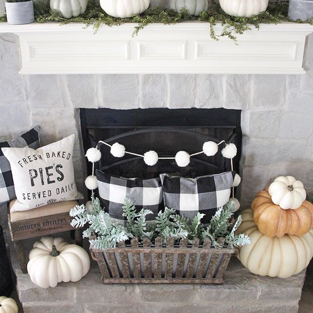 Fall fireplace decorated with cozy pillows