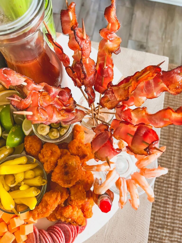 Bacon cooked on sticks and placed in a jar