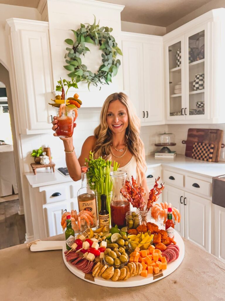 Leanna in front of a Bloody Mary Bar