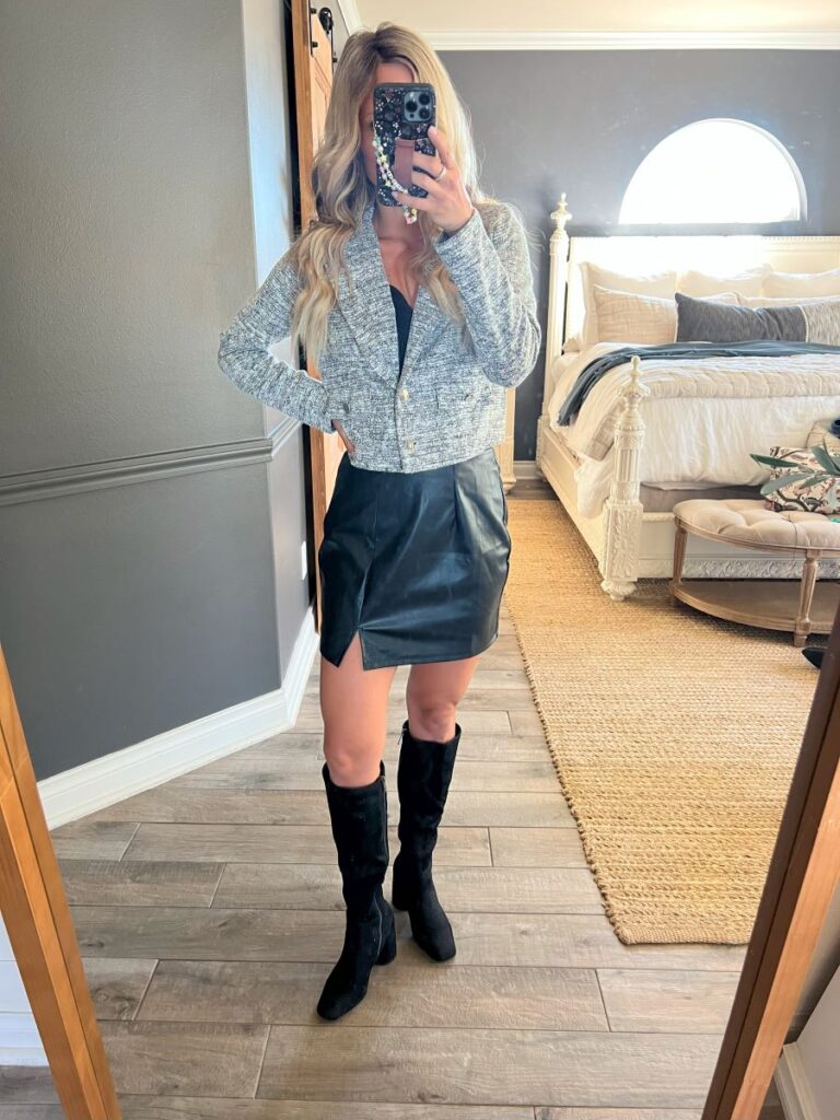 Black leather skirt with black boots for fall fashion