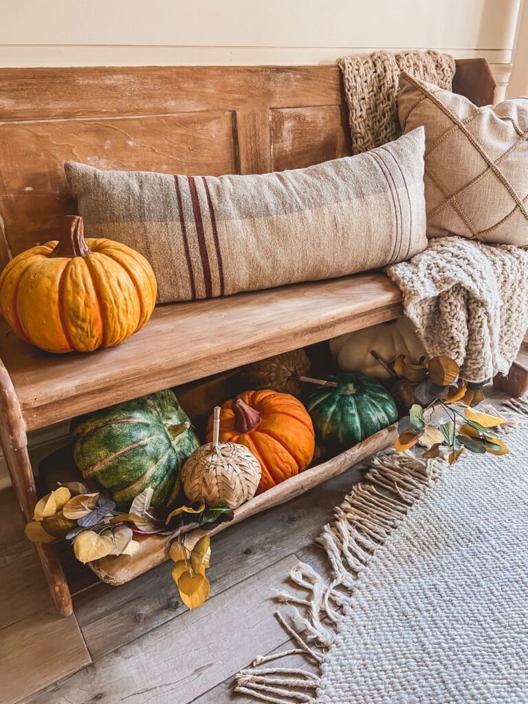 Wooden bench decorated for fall