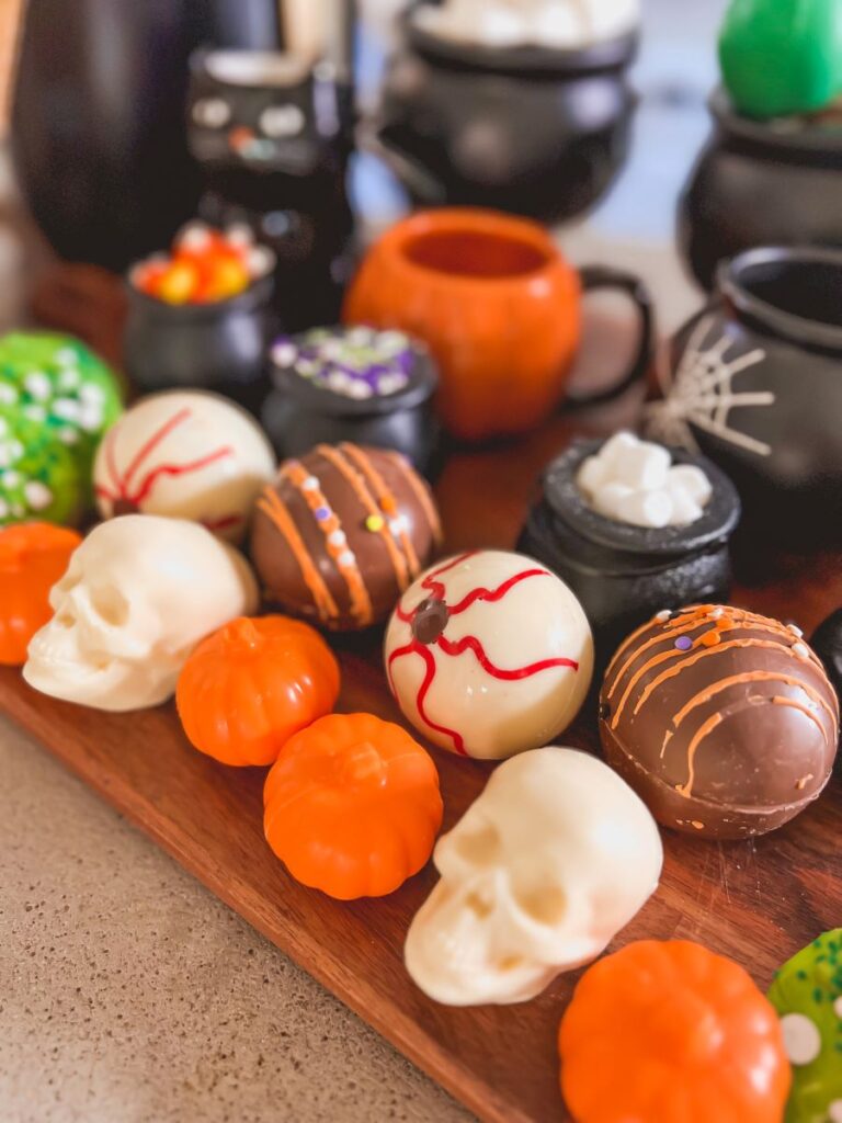 Halloween-themed Hot Chocolate Bombs and candy