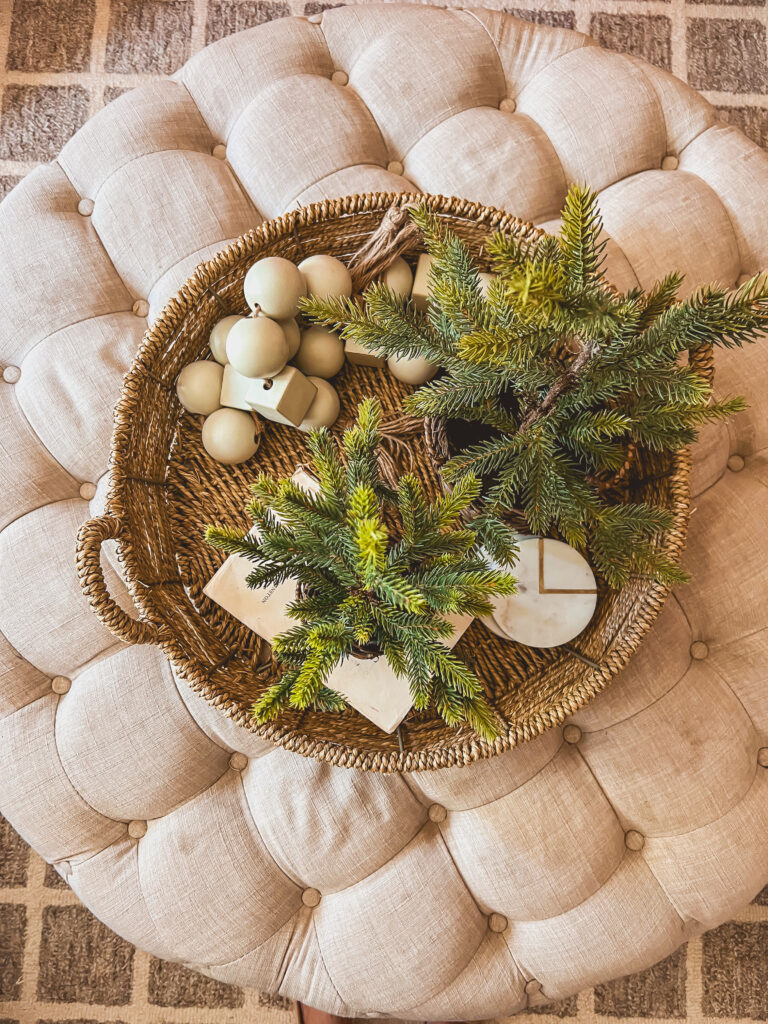 Aerial view of a tufted ottoman decorated for Christmas