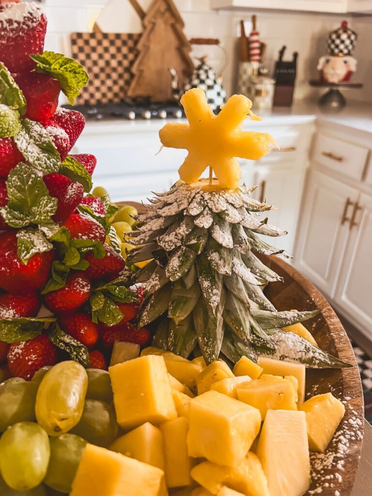 Close-up of a fruit board with festive Christmas accents