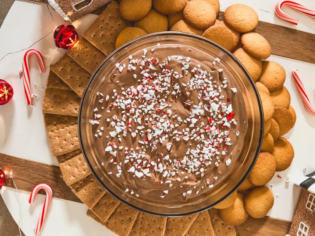 Peppermint Mocha Dip surrounded by graham crackers and Nilla Wafers