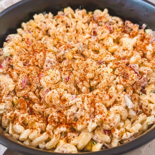 Deviled-Egg Pasta Salad sprinkled with Paprika