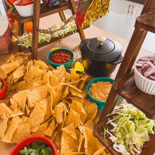 Nacho Bar covered with chips and taco fixings