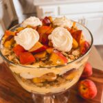 Peach Trifle garnished with whipped cream