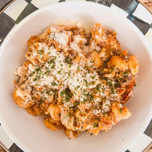 Close-up of Crockpot Million Dollar Pasta in a white bowl