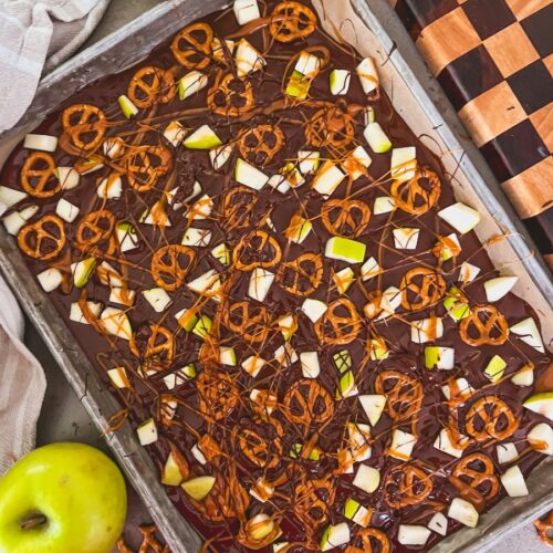 Caramel Chocolate Apple Bark on a baking sheet