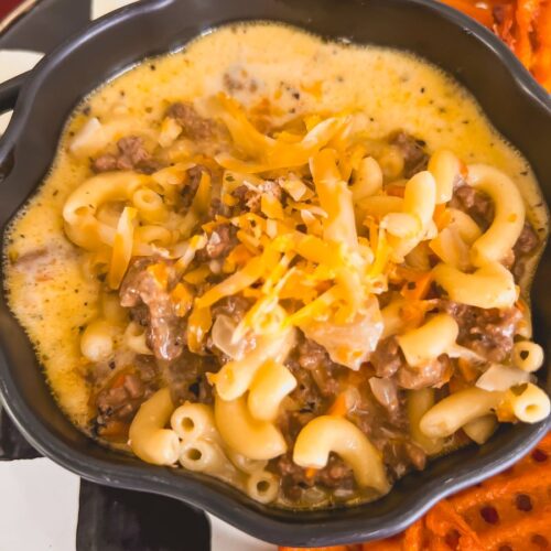 Close-up of slow cooker Cheeseburger Soup in a black bowl