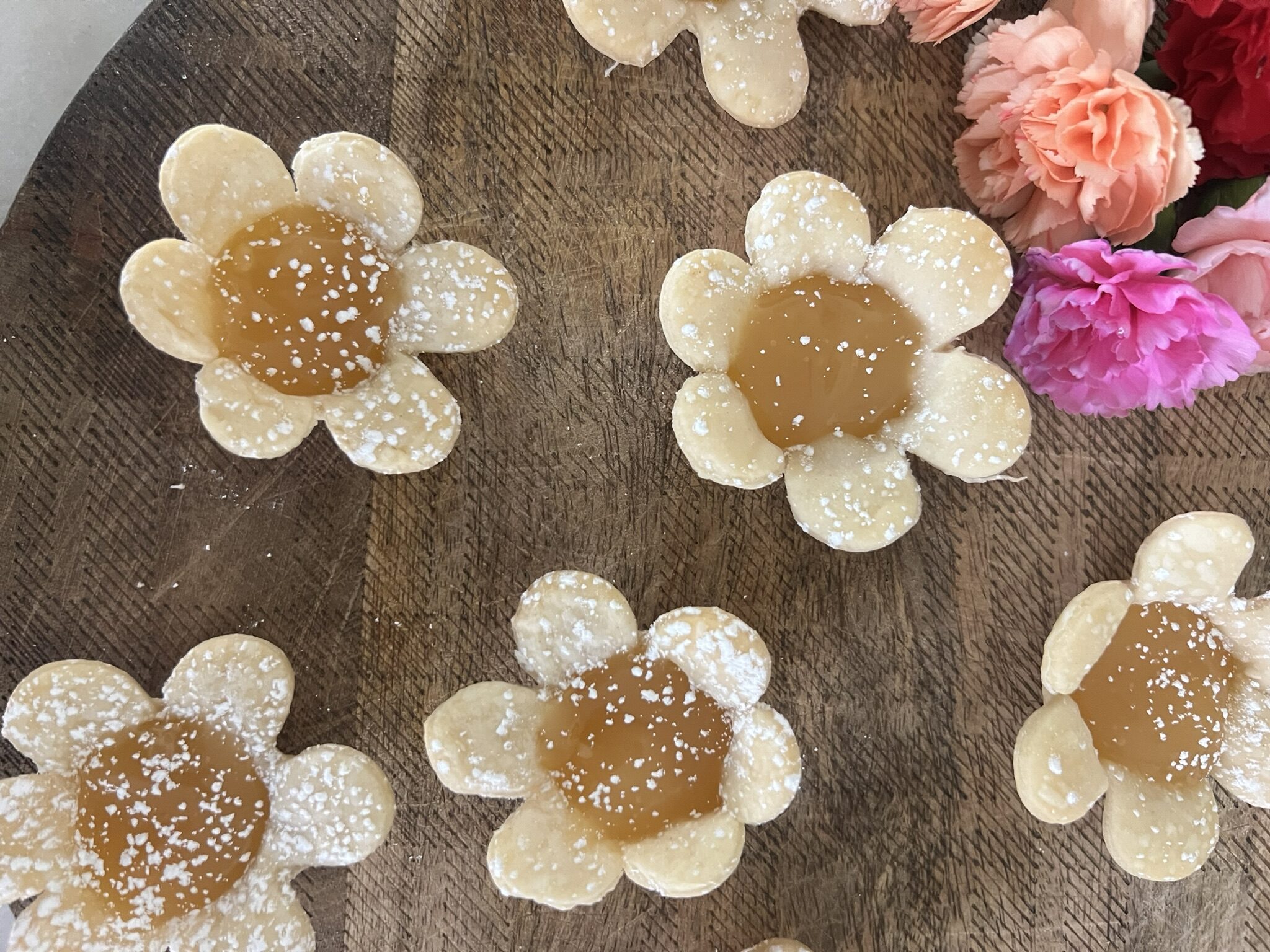 Flower Lemon Tarts dusted with powdered sugar