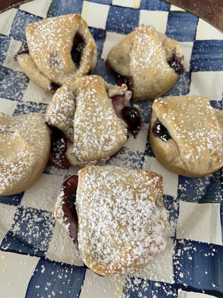 Blueberry Cheesecake Croissants on a blue checkered plate