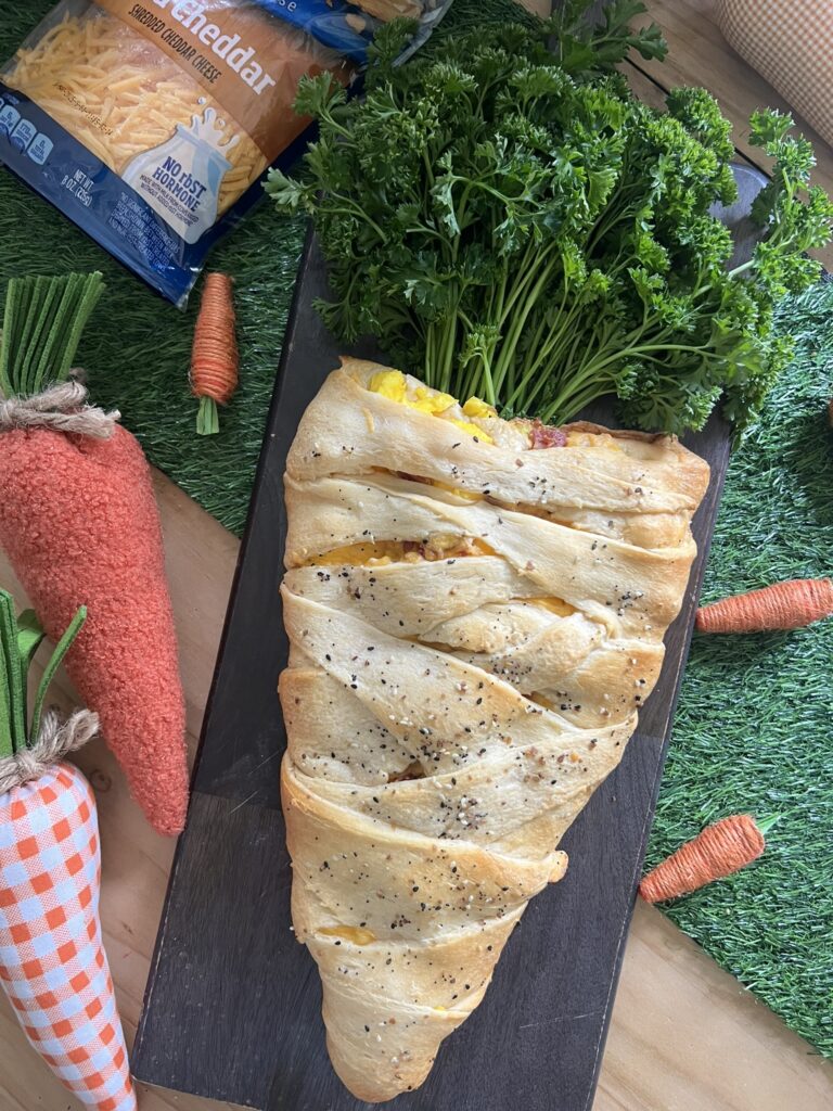 Crescent Roll Carrot topped with parsley sprigs