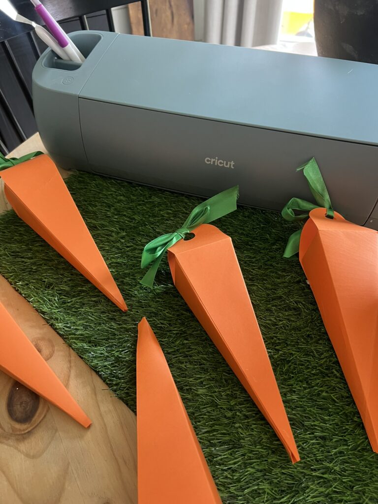 Easter craft made up of cardstock carrots