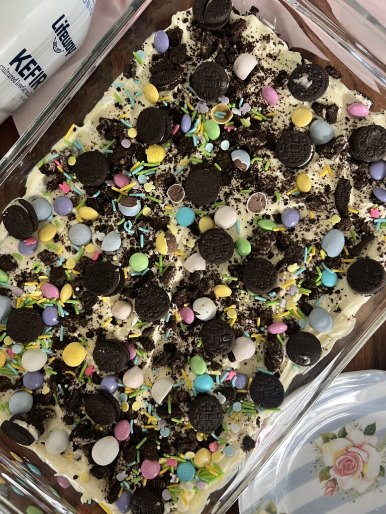 Close-up of Easter Dirt Cake covered with oreos and pastel candies