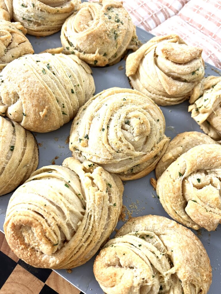 Garlic Parmesan Cruffins on a muffin tray