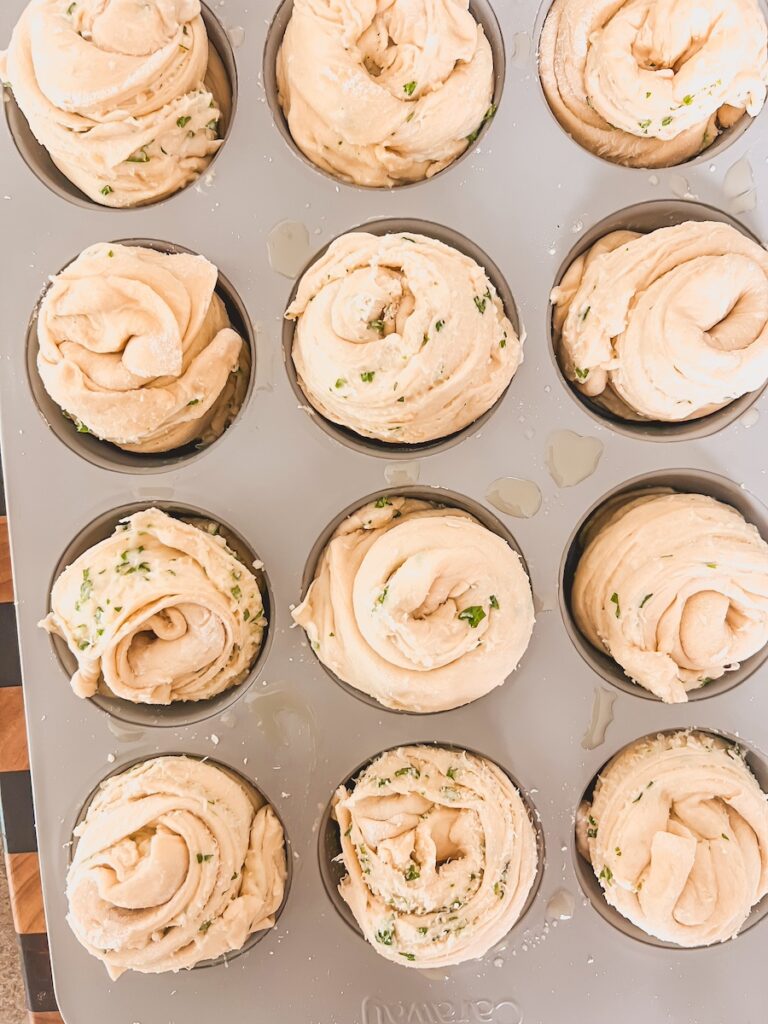 crescent dough rolled and placed in muffin tin