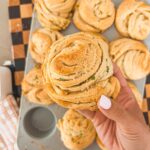 hand holding garlic parmesan cruffin